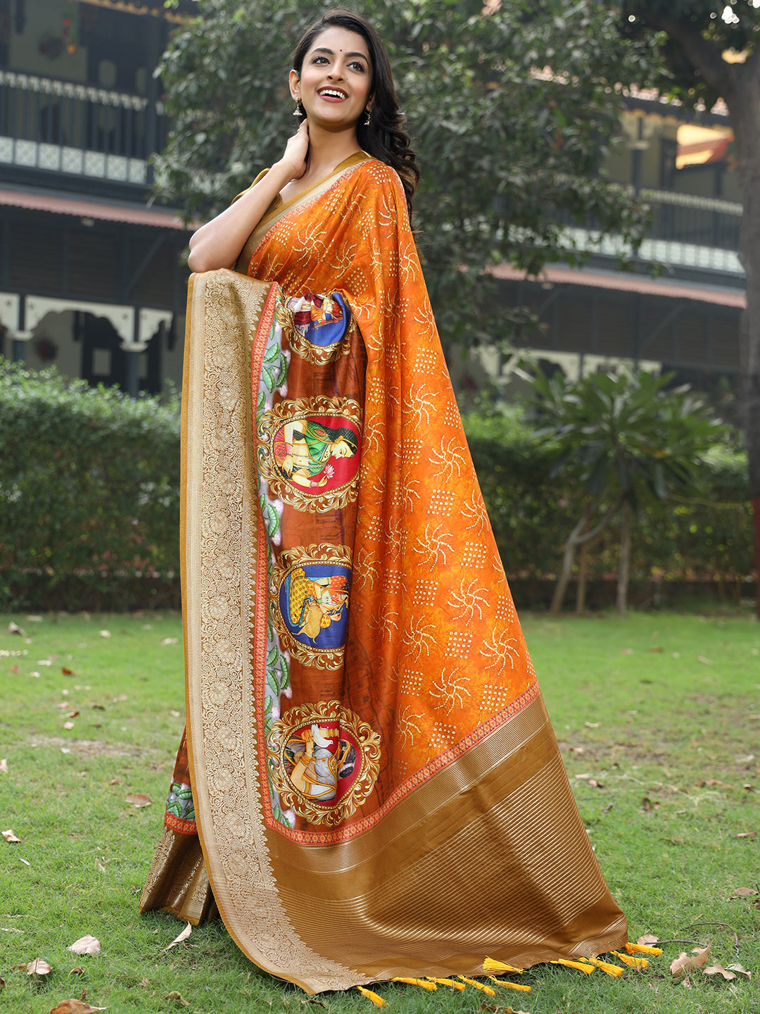 Elegant Orange Pure Viscose Dola Silk Saree with Exquisite Mughal Print Border