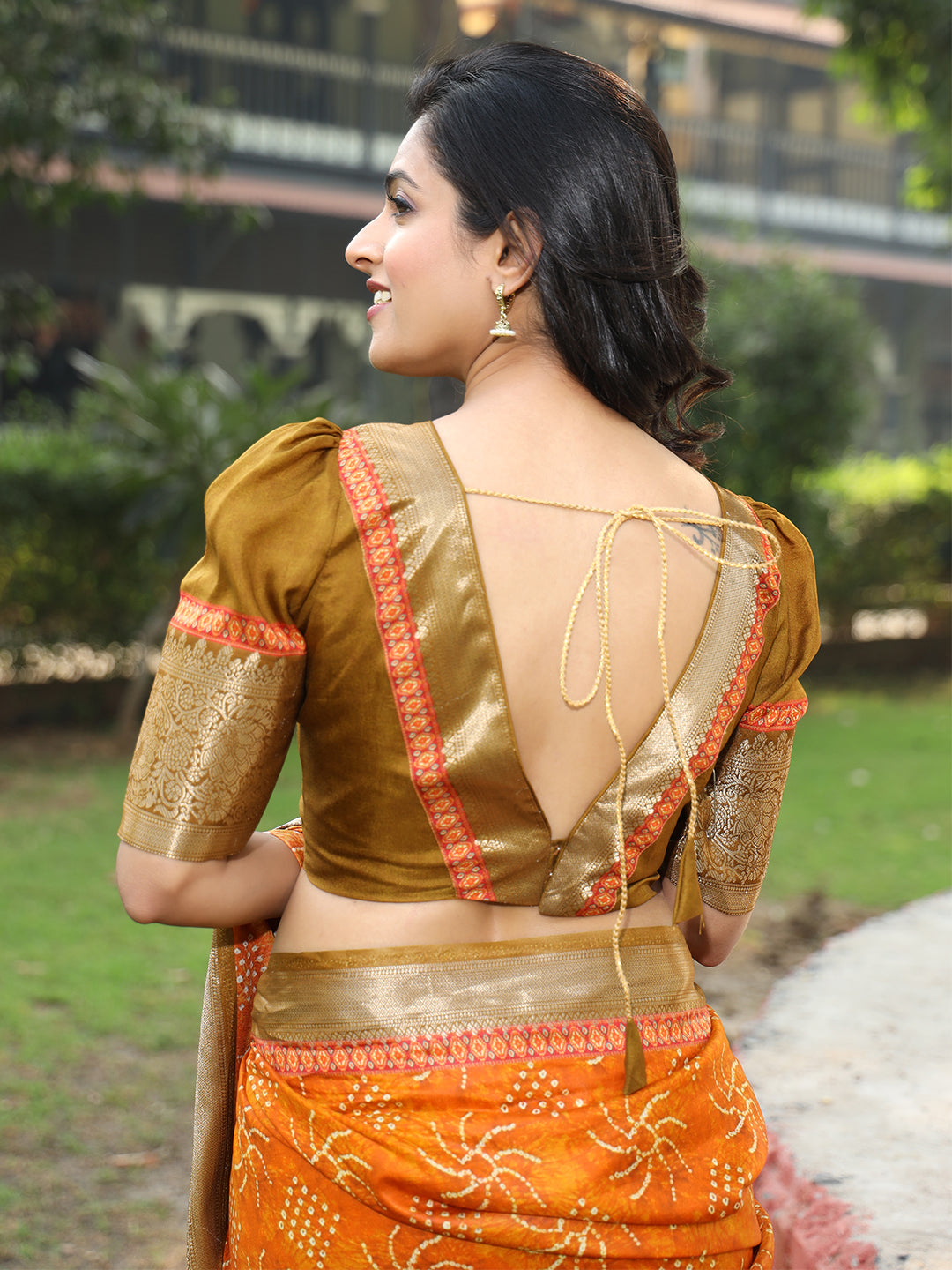 Elegant Orange Pure Viscose Dola Silk Saree with Exquisite Mughal Print Border